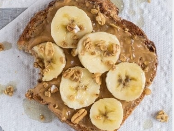 Toasted Bread with Peanut Butter and Sliced Bananas On Top