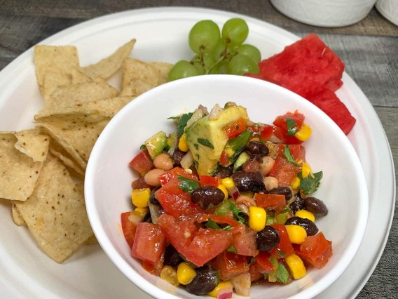 Cowboy Caviar, bean salsa with corn, peppers, tomato, cilantro
